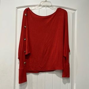 Pink Lily Dark orange small too, faux button sleeves. Long sleeve